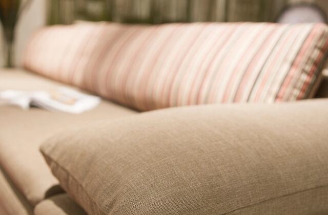 A sofa with cushions